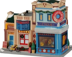 Lemax wheelie’s cycle and skate shop verlicht kersthuisje Caddington Village 2022